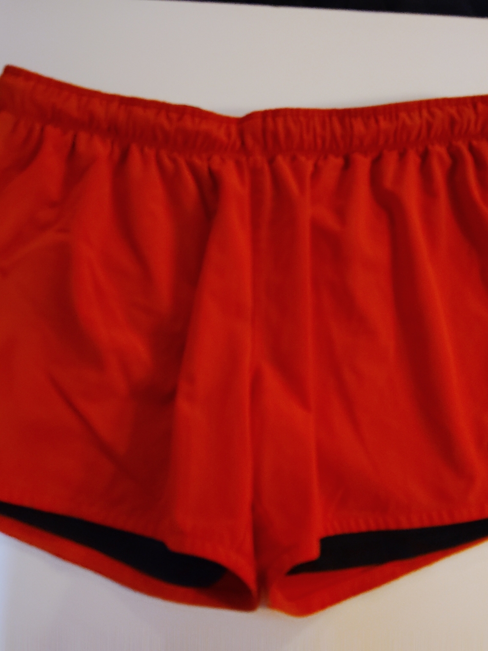 Nike Women s Athletic Shorts in Bright Orange with Black Trim